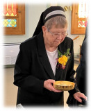 Sister-Patricia-offering-the-bread