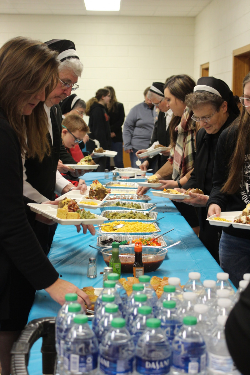 Sisters-and-families-at-Religious-Ed-potluck